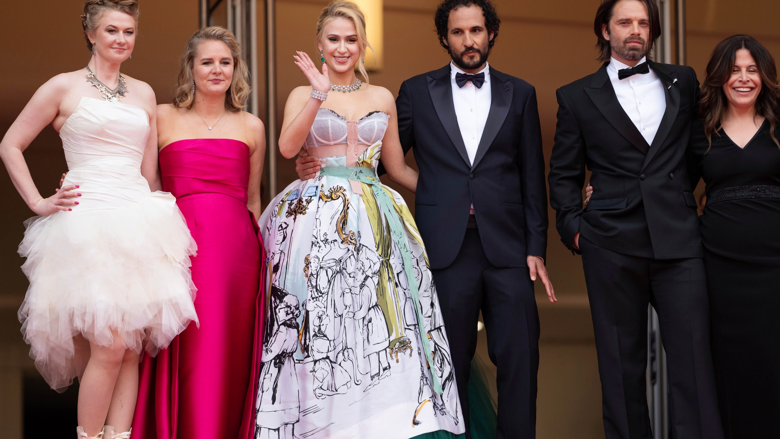 FILE - Julianne Forde, from left, Ruth Treacy, Maria Bakalova, director Ali Abbasi, Sebastian Stan, and Amy Baer pose for photographers upon arrival at the premiere of the film 'The Apprentice' at the 77th international film festival, Cannes, southern France, on May 20, 2024. (Photo by Scott A Garfitt/Invision/AP, File)