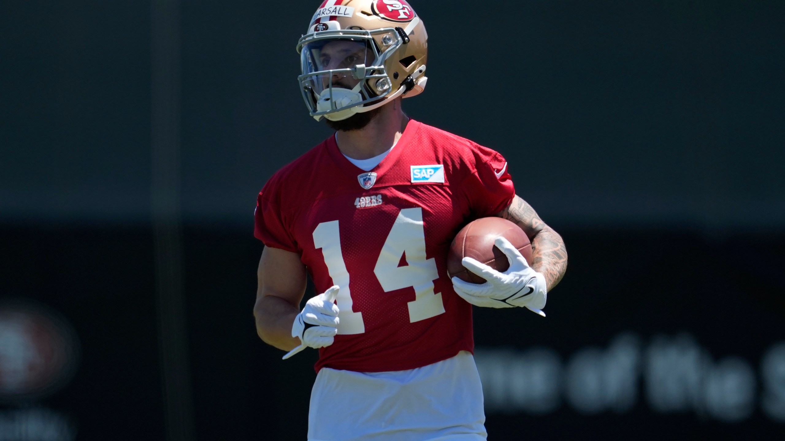 FILE - San Francisco 49ers wide receiver Ricky Pearsall carries the ball during the NFL football team's rookie minicamp in Santa Clara, Calif., May 10, 2024. (AP Photo/Jeff Chiu, File)