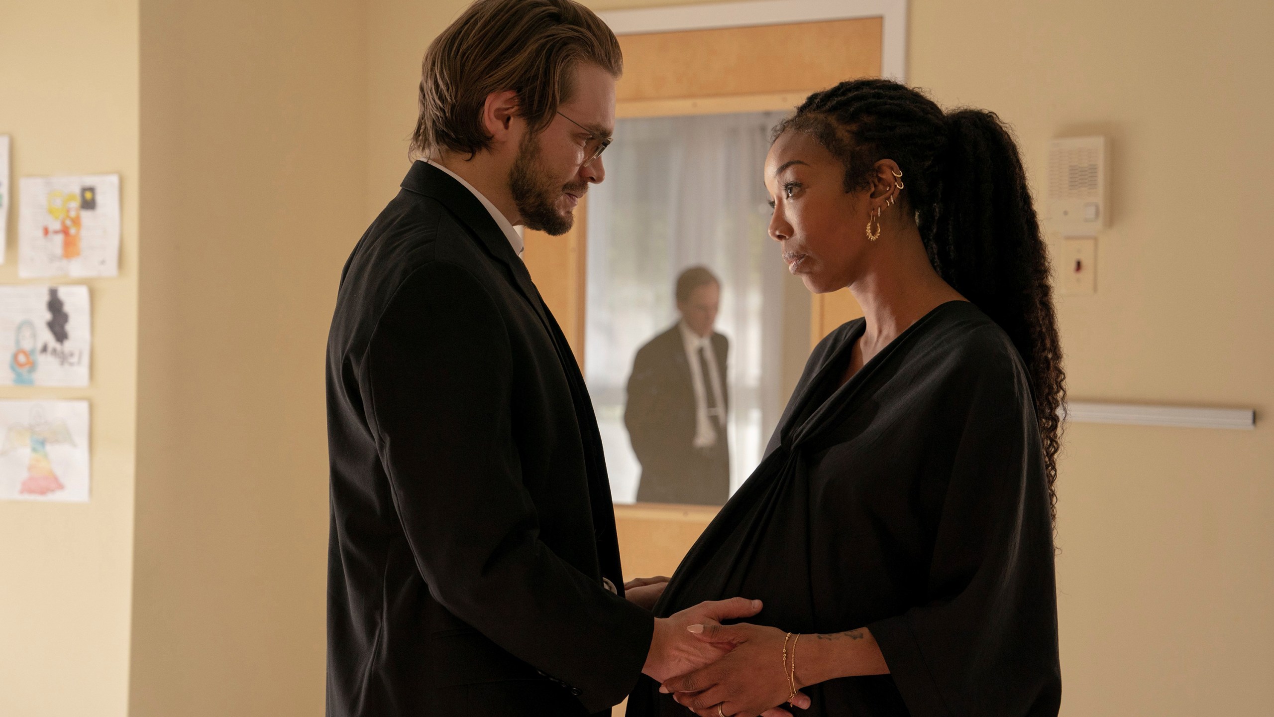 This image released by A24 shows Andrew Burnap, left, and Brandy Norwood in a scene from "The Front Room." (A24 via AP)