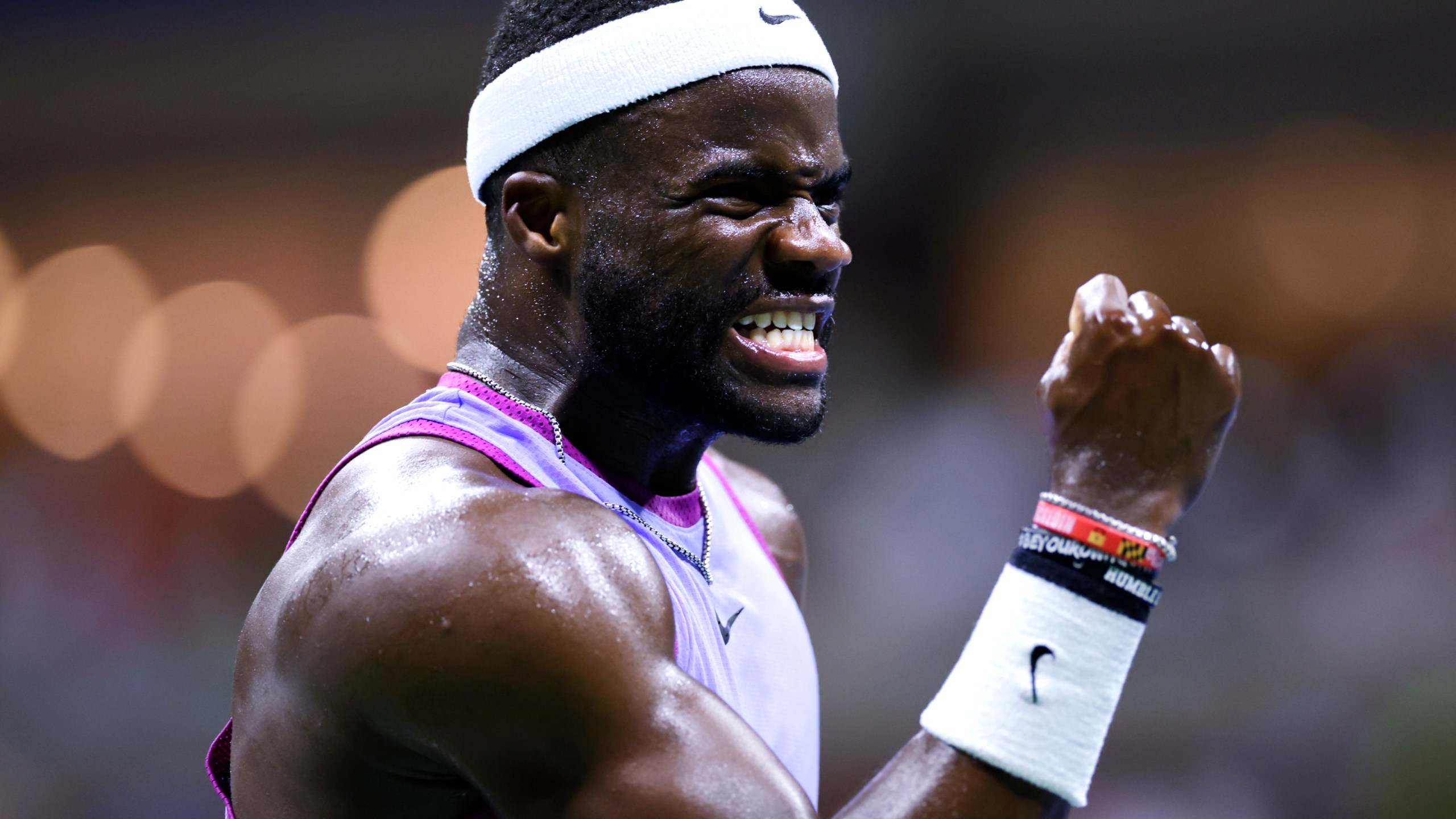 Frances Tiafoe, of the United States, celebrates after winning a point against Grigor Dimitrov, of Bulgaria, during the quarterfinals of the U.S. Open tennis championships, Tuesday, Sept. 3, 2024, in New York. (AP Photo/Adam Hunger)