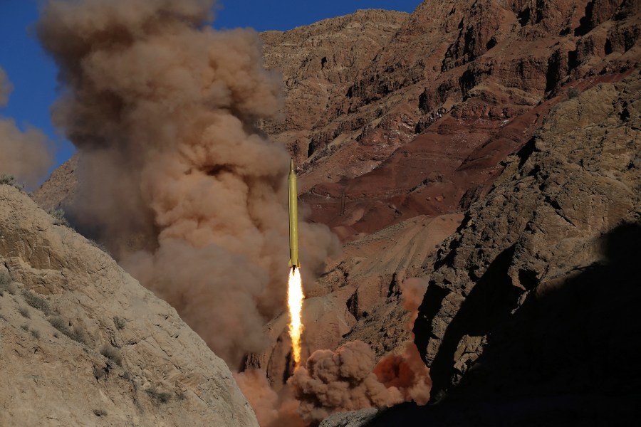 FILE - A Qadr H long-range ballistic surface-to-surface missile is fired by Iran's Revolutionary Guard during a maneuver in an undisclosed location in Iran, on March 9, 2016. (AP Photo/Omid Vahabzadeh, File)