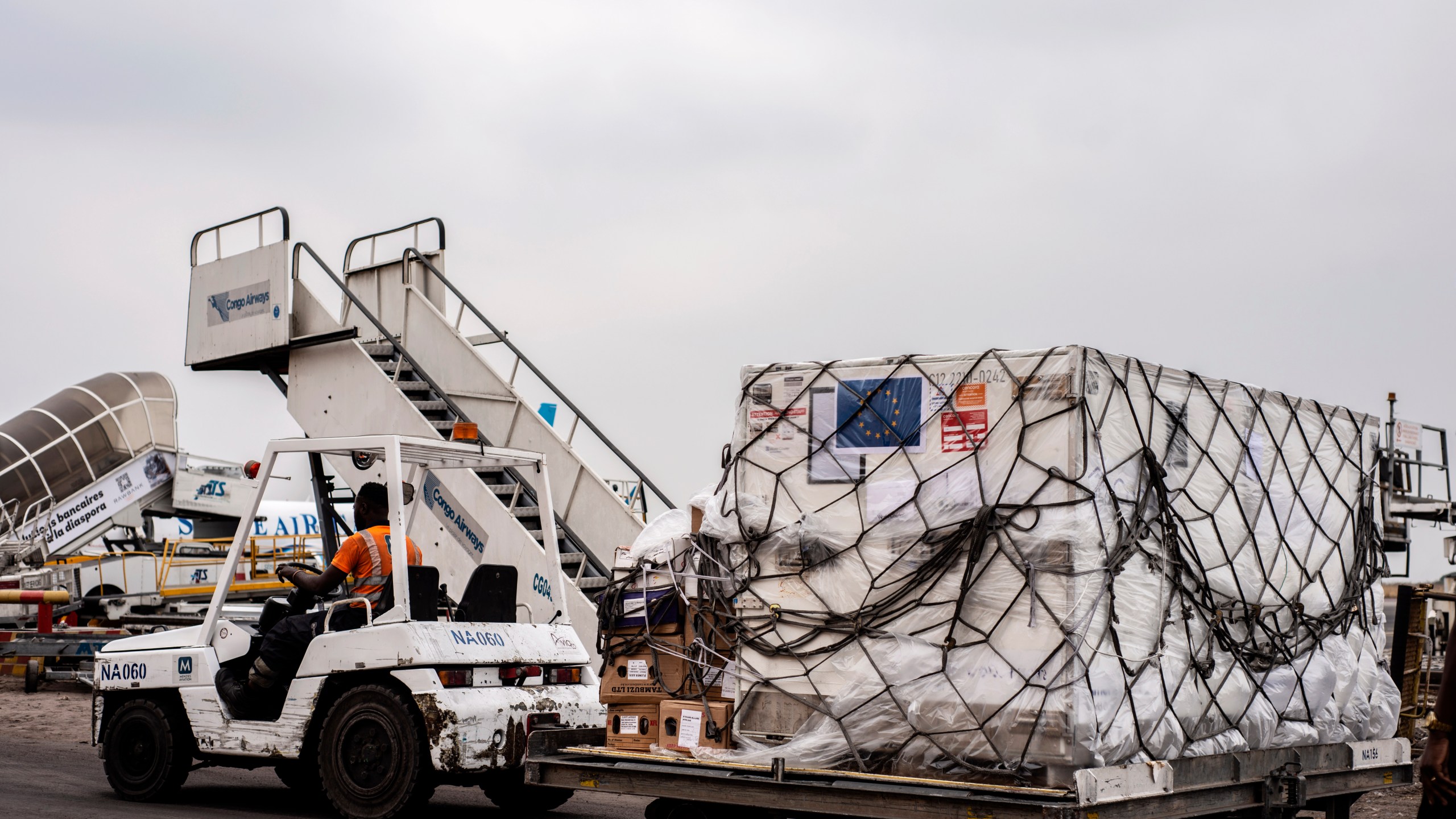 FILE- Mpox vaccine MVA-BN vaccine, manufactured by the Danish company Bavarian Nordic, are offloaded from a plane in Kinshasa, Congo, Sept. 5, 2024. (AP Photo/Samy Ntumba Shambuyi, File)