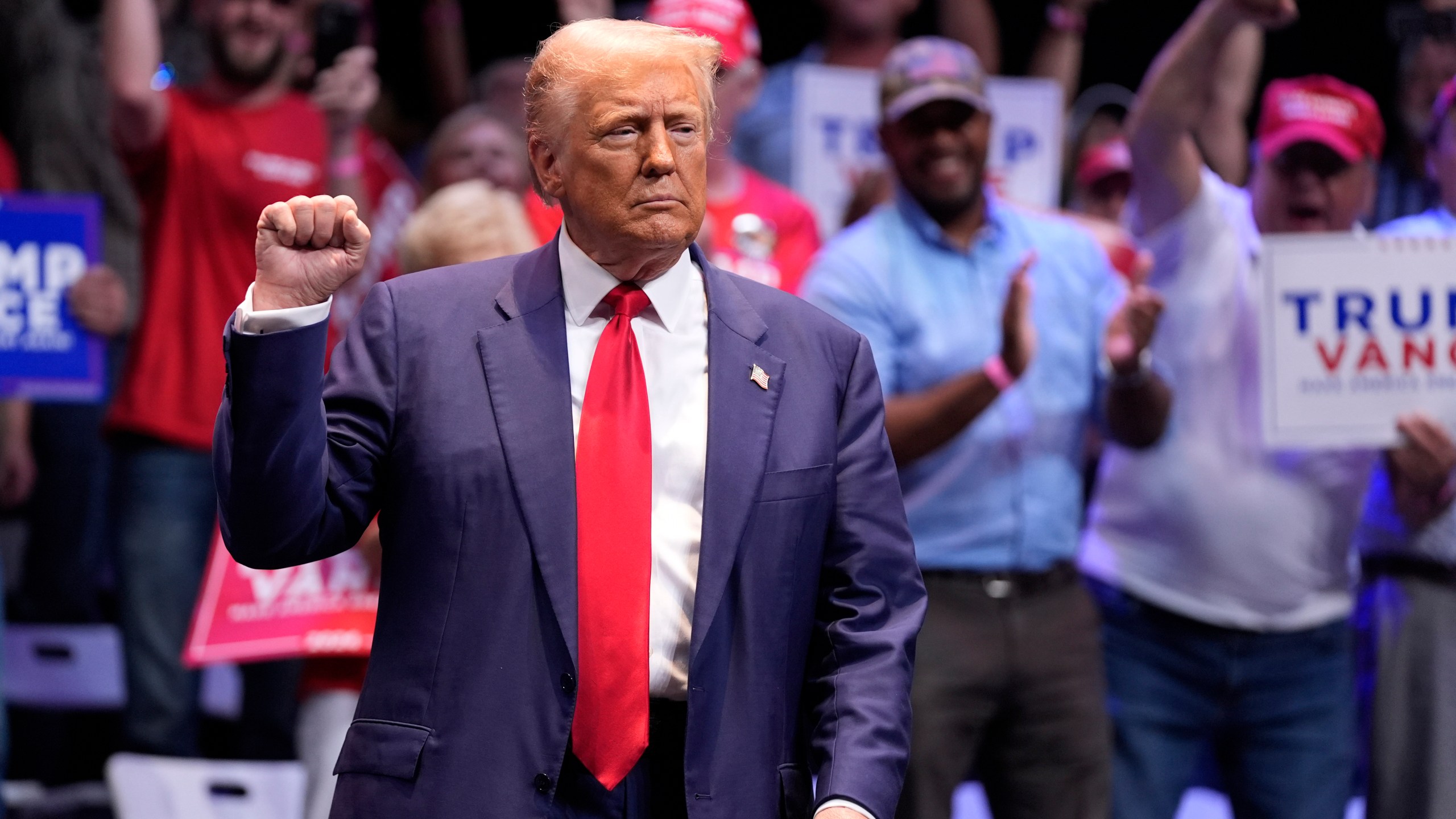 Republican presidential nominee former President Donald Trump arrives to speak about the tax code and manufacturing at the Johnny Mercer Theatre Civic Center, Tuesday, Sept. 24, 2024, in Savannah, Ga. (AP Photo/Evan Vucci)