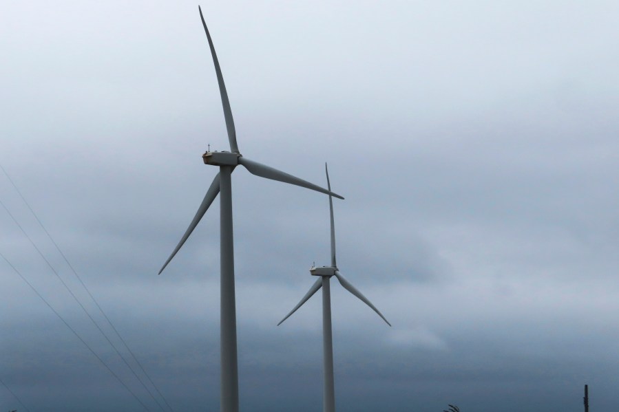 Land-based wind turbines spin in Atlantic City, N.J. on Sept. 18, 2024. (AP Photo/Wayne Parry)