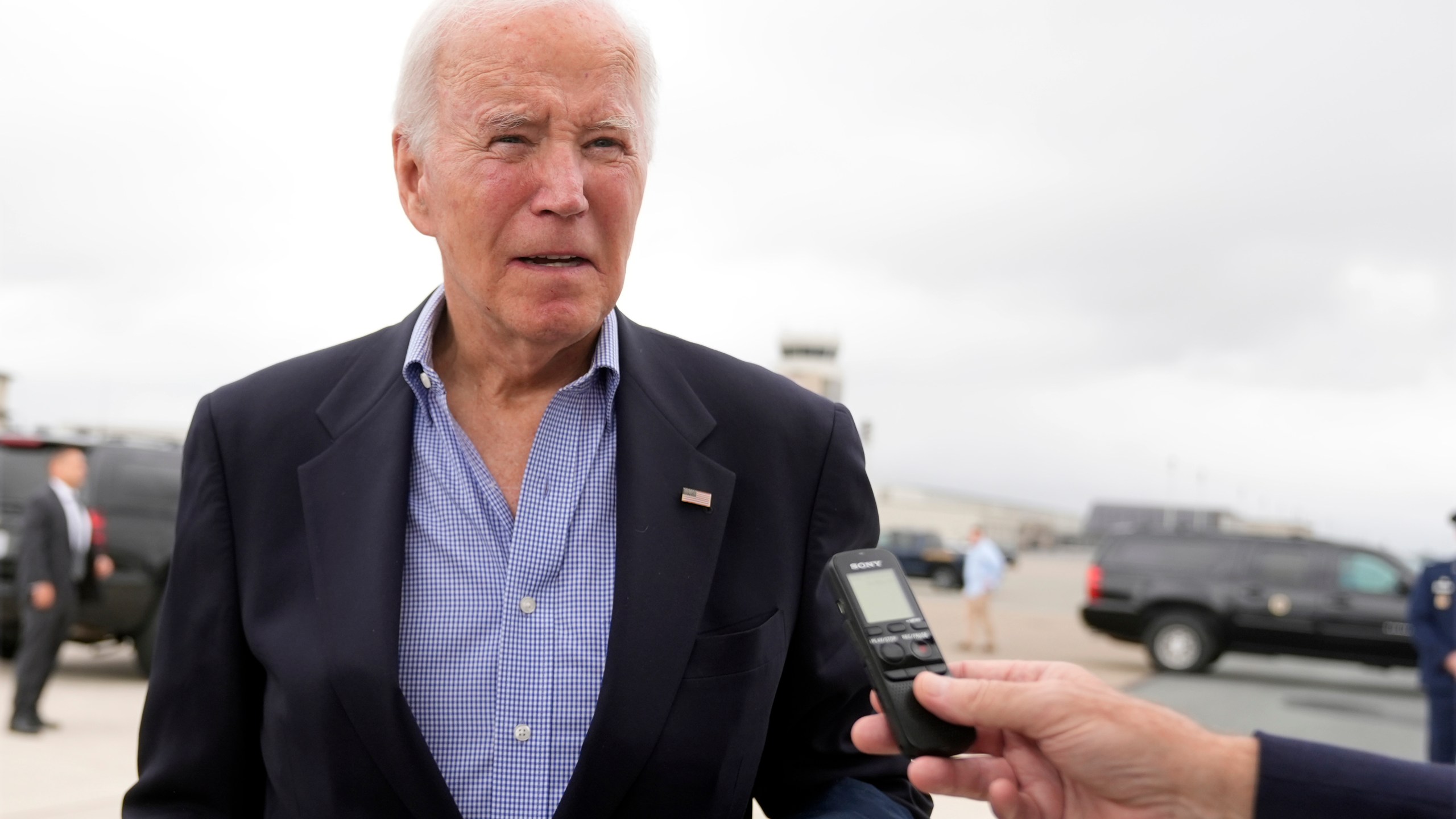 President Joe Biden speaks to reporters before boarding Air Force One at Dover Air Force Base, in Dover, Del., Sunday, Sept. 29, 2024, to return to Washington. (AP Photo/Manuel Balce Ceneta)