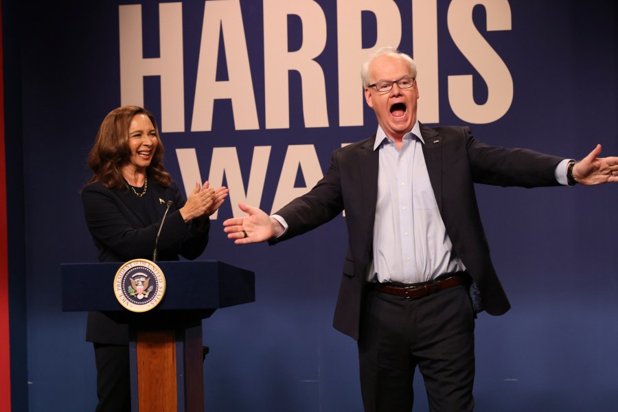 This image released by NBC shows Maya Rudolph as Kamala Harris, left, and Jim Gaffigan as Tim Walz, during the cold open sketch on "Saturday Night Live" in New York on Saturday, Sept. 28, 2024. (Will Heath/NBC via AP)