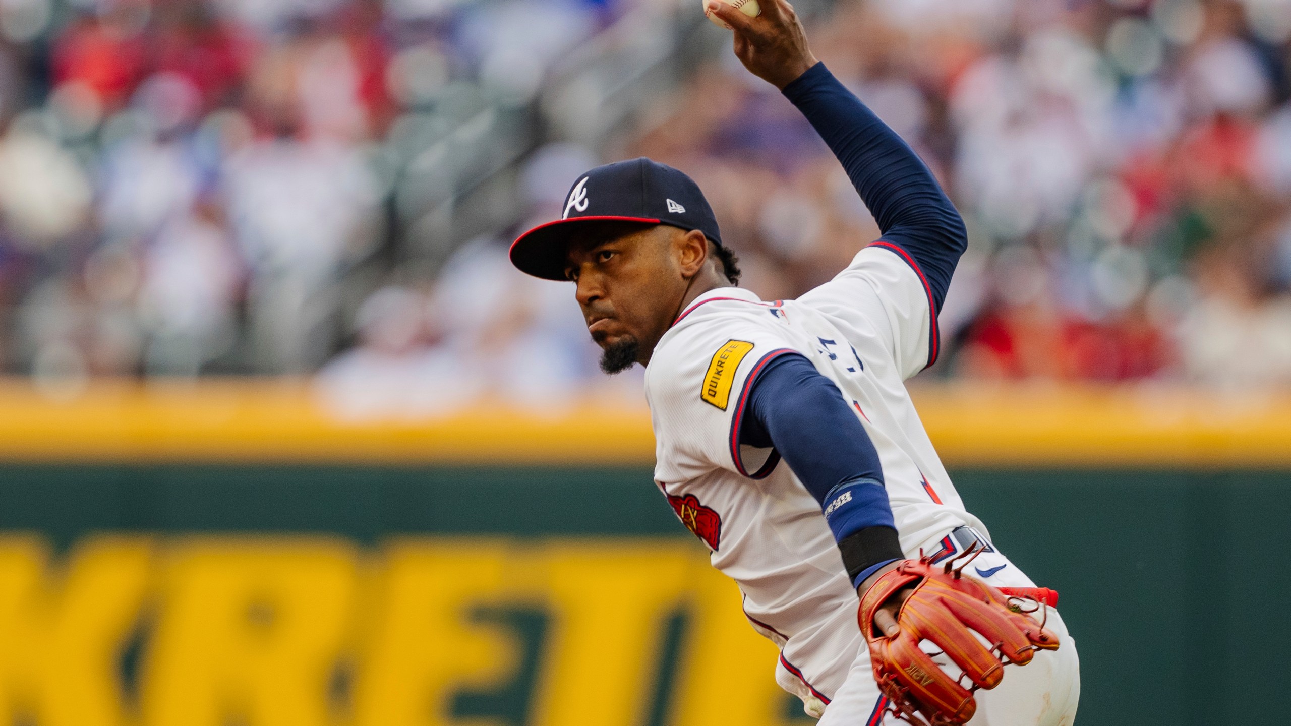 Atlanta Braves second baseman Ozzie Albies throws out New York Mets' Jose Iglesias at first base in the sixth inning of a baseball game, Monday, Sept. 30, 2024, in Atlanta. (AP Photo/Jason Allen)