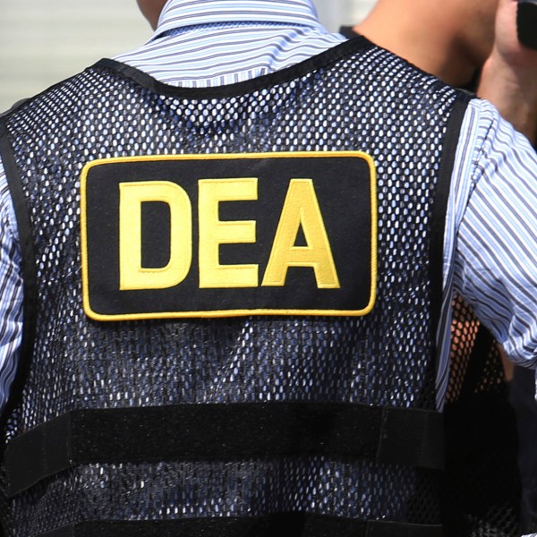 FILE - Drug Enforcement Administration agents are seen in Florida, June 13, 2016. (Joe Burbank/Orlando Sentinel via AP, File)