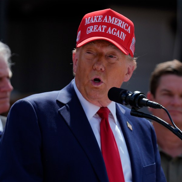 Republican presidential nominee former President Donald Trump speaks outside the Chez What furniture store as he visits Valdosta, Ga., a town impacted by Hurricane Helene, Monday, Sept. 30, 2024. (AP Photo/Evan Vucci)