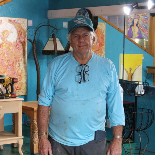 Freddie Pell stands in his art gallery in downtown Boone, N.C., that was flooded when Tropical Storm Helene passed over western North Carolina, Monday, Sept. 30, 2024. (AP Photo/Makiya Seminera)