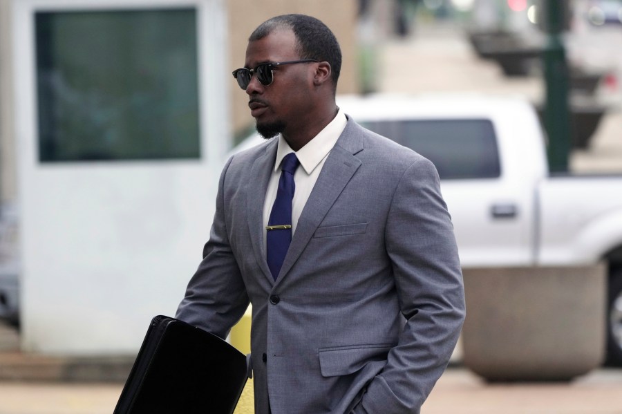 Justin Smith, one of three former Memphis police officers charged in the 2023 fatal beating of Tyre Nichol, arrives at the federal courthouse for the day's proceedings on Tuesday, Oct. 1, 2024, in Memphis, Tenn. (AP Photo/Karen Pulfer Focht)