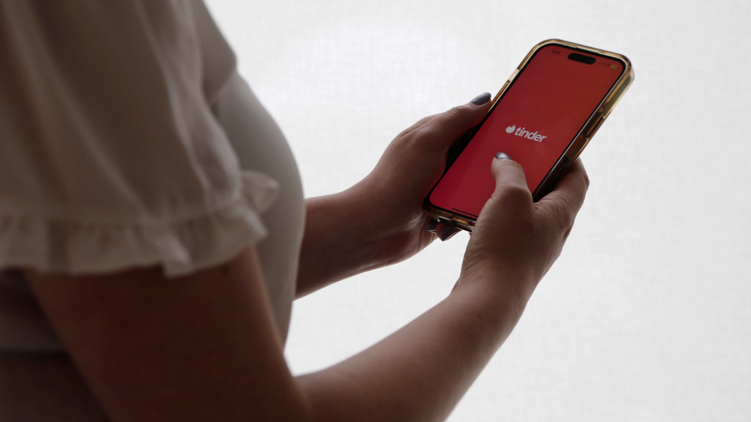 FILE - The dating app Tinder is shown on a smartphone on June 26, 2024, in New York. (AP Photo/Peter Morgan, File)