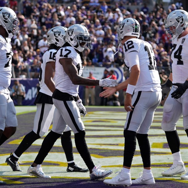 Las Vegas Raiders wide receiver Davante Adams (17) celebrates after scoring a touchdown against the Baltimore Ravens during the second half of an NFL football game, Sunday, Sept. 15, 2024, in Baltimore. (AP Photo/Stephanie Scarbrough)