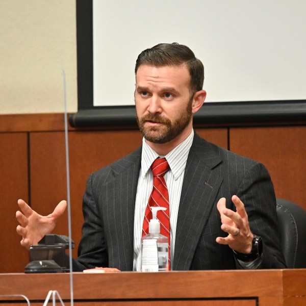 FILE - Sgt. Kyle Meany of the Louisville Metro Police Department testifies, Feb. 23, 2022, in Louisville, Ky. (AP Photo/Timothy D. Easley, Pool, File)