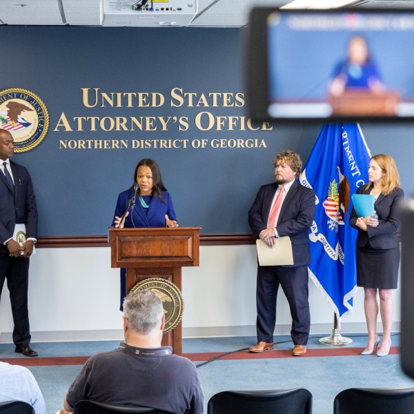 Assistant Attorney General Kristen Clarke, center, of the Justice Department's Civil Rights Division speaks about a new Department of Justice report about the state of Georgia's prisons at a press conference at the Richard B. Russell Federal Building in Atlanta, Tuesday, Oct. 1, 2024. On her left is U.S. Attorney Ryan K. Buchanan for the Northern District of Georgia and on her right are U.S. Attorney Peter D. Leary for the Middle District of Georgia and U.S. Attorney Jill E. Steinberg for the Southern District of Georgia. (Arvin Temkar/Atlanta Journal-Constitution via AP)