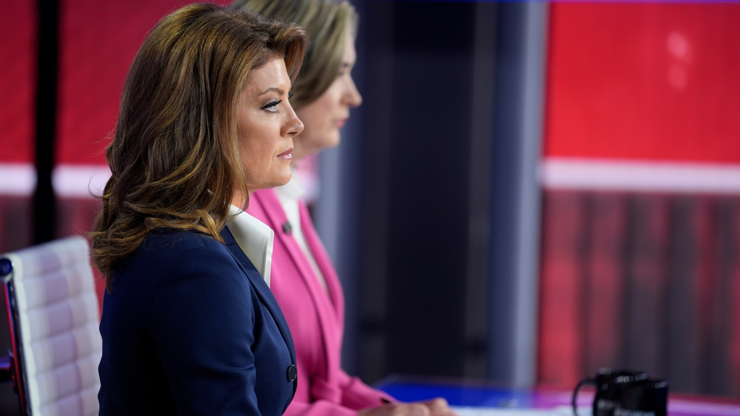 Moderators Norah O'Donnell and Margaret Brennan listen as Republican vice presidential nominee Sen. JD Vance, R-Ohio, speaks during a vice presidential debate hosted by CBS News, with Democratic vice presidential candidate Minnesota Gov. Tim Walz, Tuesday, Oct. 1, 2024, in New York. (AP Photo/Matt Rourke)