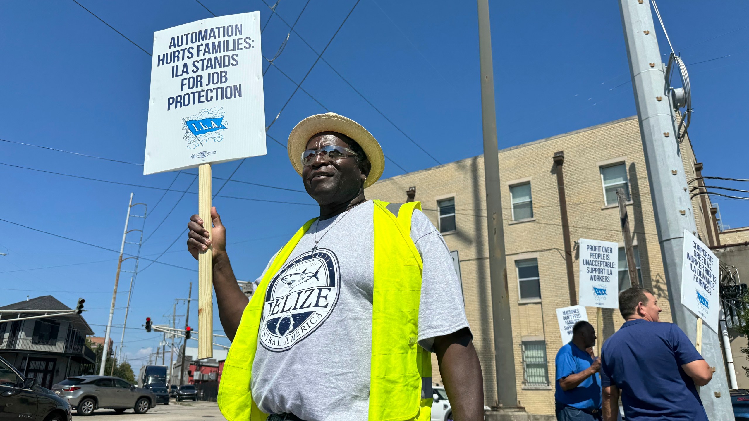 Striking International Longshoremen's Association dockworker Henderson Wilson, 61, stands on the picket line near the Port of New Orleans in Louisiana, Tuesday, Oct. 1, 2024. (AP Photo/Jack Brook)