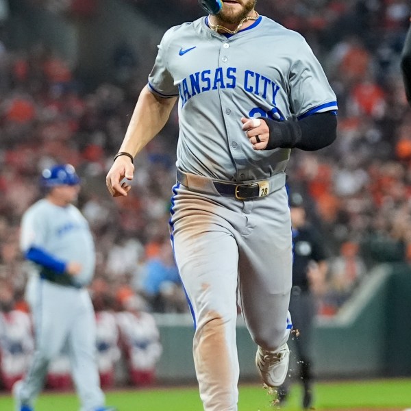 Kansas City Royals' Kyle Isbel scores on an infield single by Bobby Witt Jr. during the sixth inning in Game 2 of an AL Wild Card Series baseball game against the Baltimore Orioles, Wednesday, Oct. 2, 2024 in Baltimore. (AP Photo/Stephanie Scarbrough)