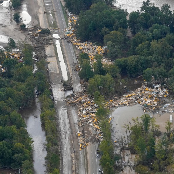 An aerial view of flood damage in the aftermath of Hurricane Helene, Saturday, Sept. 28, 2024, in Erwin, Tenn. (AP Photo/George Walker IV)