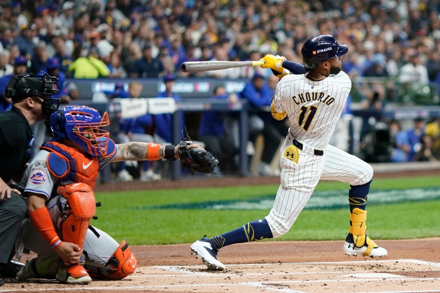 Milwaukee Brewers' Jackson Chourio hits a home run during the first inning of Game 2 of a National League wild card baseball game against the New York Mets Wednesday, Oct. 2, 2024, in Milwaukee. (AP Photo/Morry Gash)