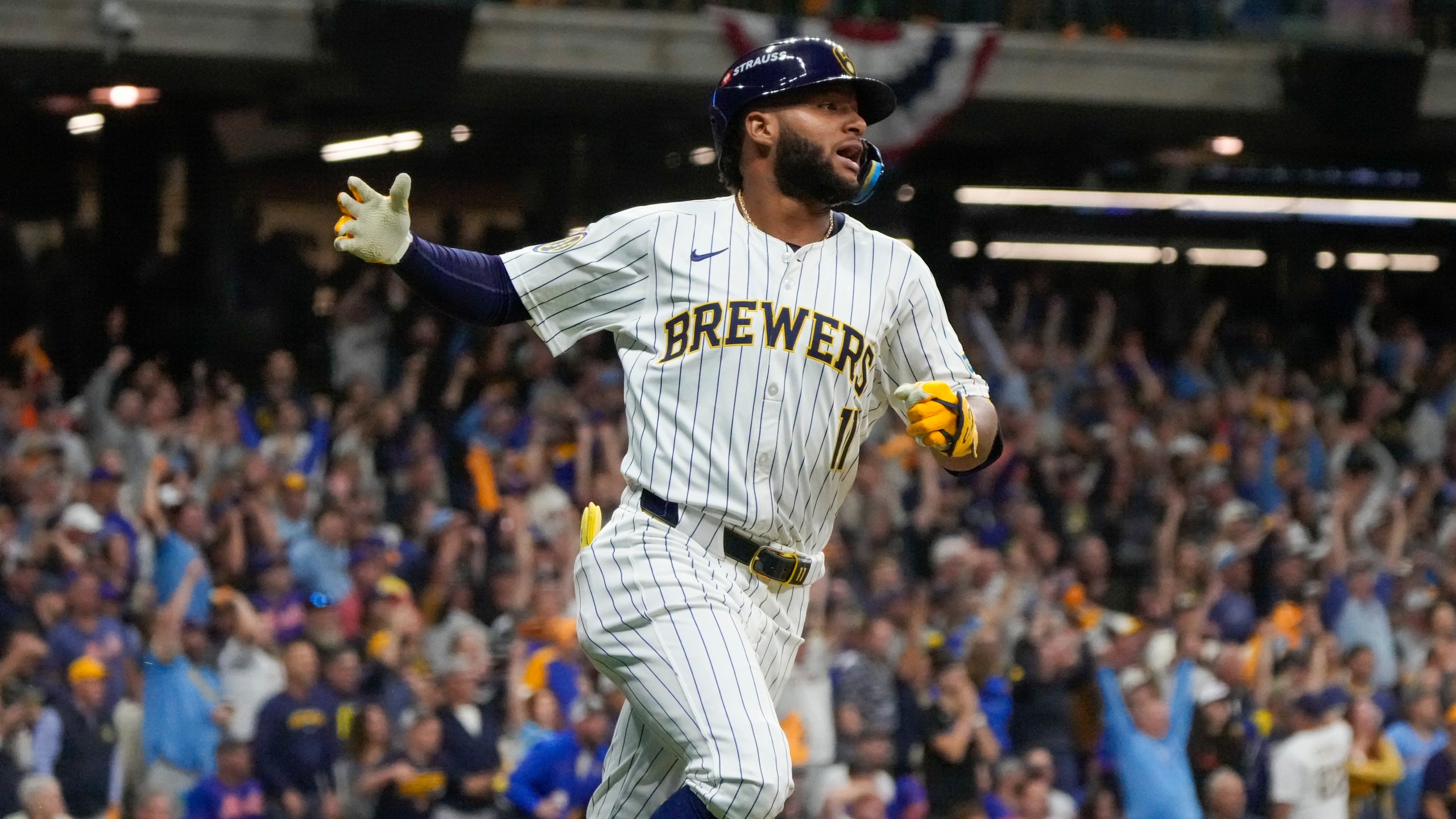 Milwaukee Brewers' Jackson Chourio reacts after hitting a home run during the eighth inning of Game 2 of a National League wild card baseball game against the New York Mets Wednesday, Oct. 2, 2024, in Milwaukee. (AP Photo/Morry Gash)