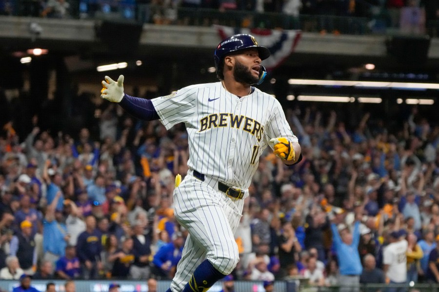 Milwaukee Brewers' Jackson Chourio reacts after hitting a home run during the eighth inning of Game 2 of a National League wild card baseball game against the New York Mets Wednesday, Oct. 2, 2024, in Milwaukee. (AP Photo/Morry Gash)