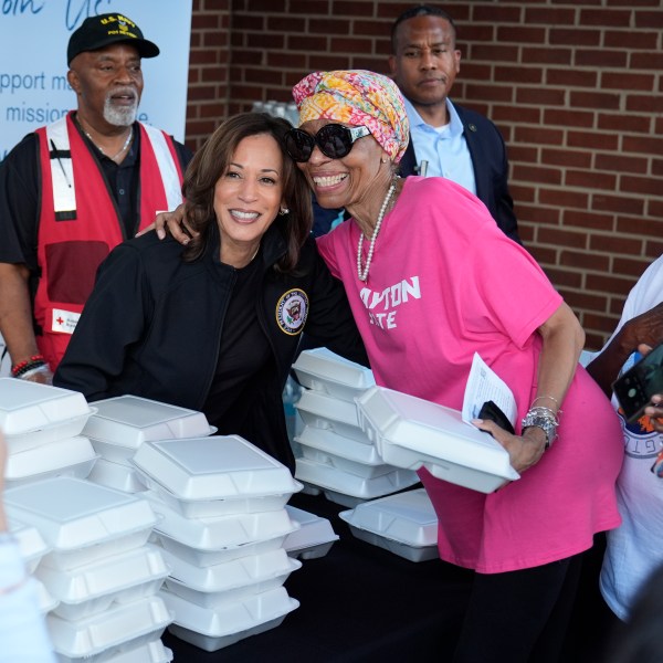 Democratic presidential nominee Vice President Kamala Harris poses for a photo as she helps distribute food with the American Red Cross at the Henry Brigham Community Center in Augusta, Ga., Wednesday, Oct. 2, 2024. (AP Photo/Carolyn Kaster)