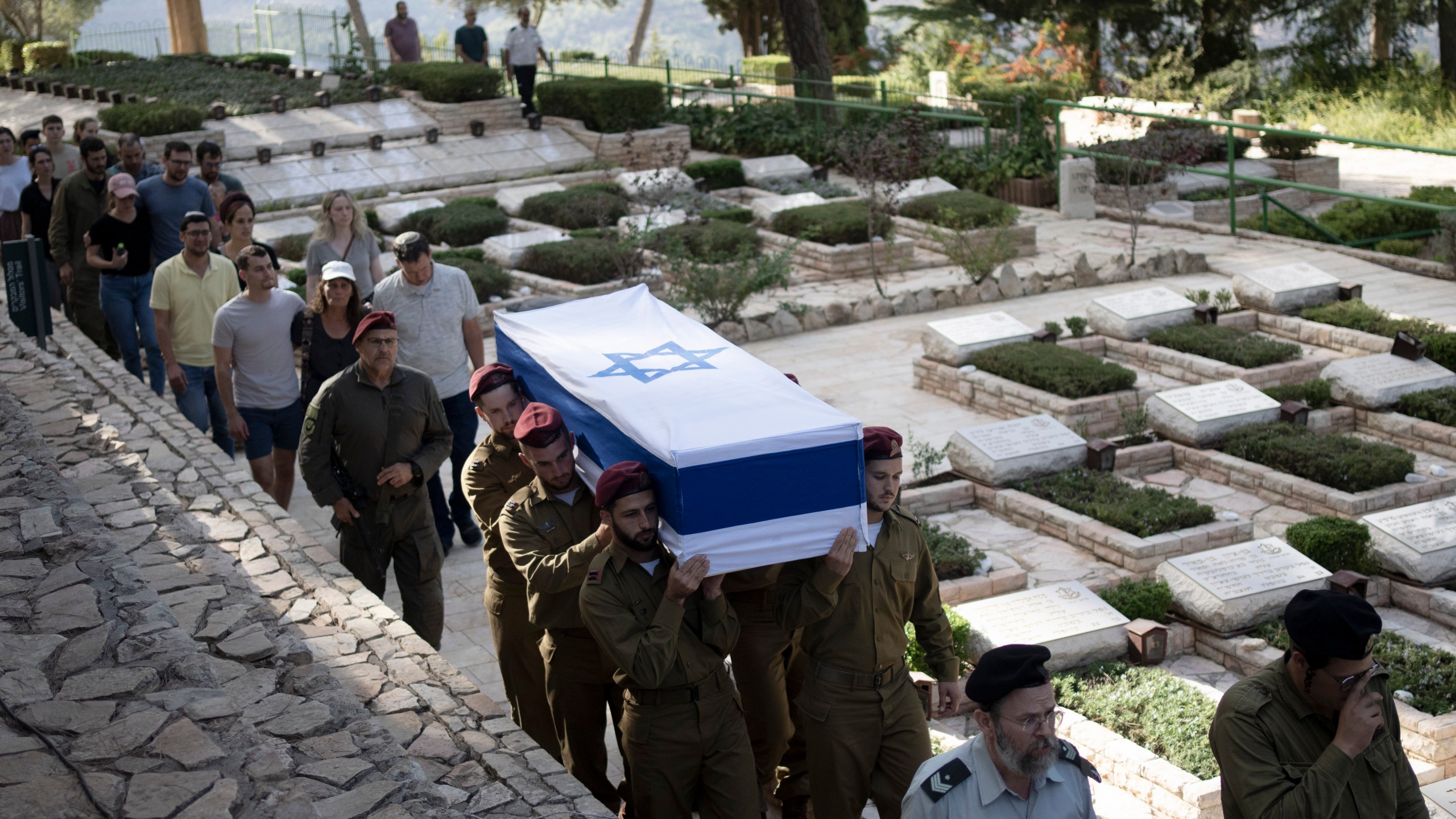 Soldiers carry the coffin of Israeli Army Capt. Eitan Yitzhak Oster, who was killed in action in Lebanon, during his funeral at Mt. Herzl military cemetery in Jerusalem, Wednesday, Oct. 2, 2024. (AP Photo/Maya Alleruzzo)