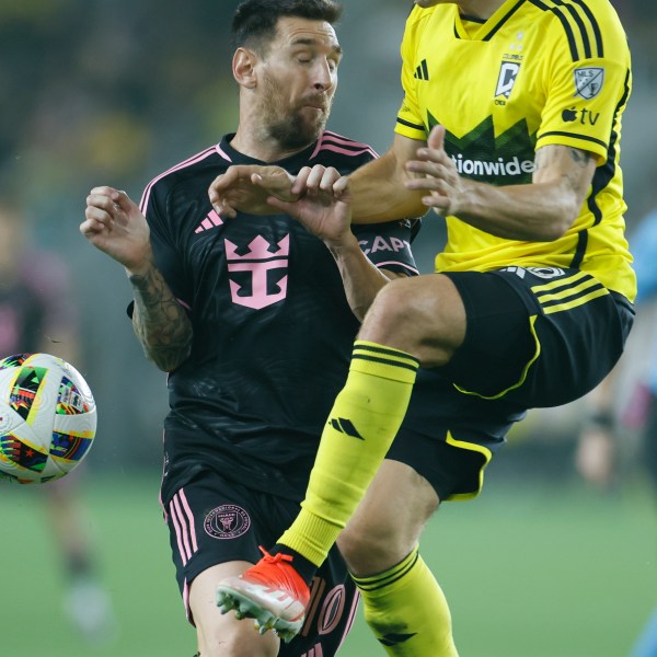 Inter Miami's Lionel Messi, left, collides with Columbus Crew's Malte Amundsen during the second half of an MLS soccer match, Wednesday, Oct. 2, 2024, in Columbus, Ohio. (AP Photo/Jay LaPrete)