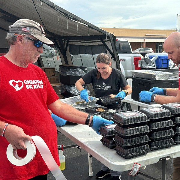 Volunteers for Operation BBQ Relief prepare meals for people without power or water, Oct. 1, 2024, in Augusta, Georgia. (AP Photo / Jeffrey Collins)