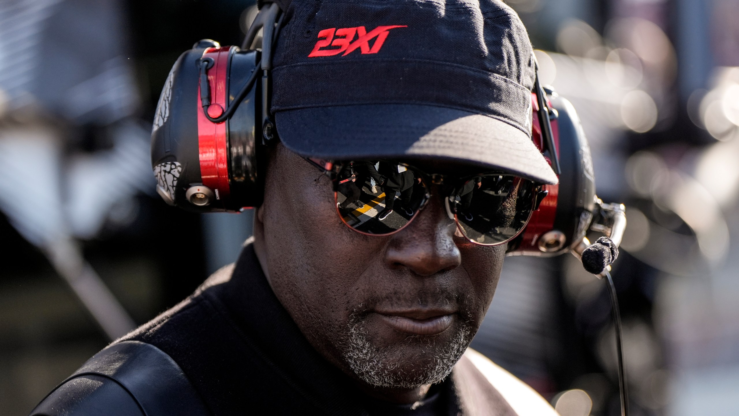 FILE - 23XI Racing co-owner Michael Jordan stands in the pit area during a NASCAR Cup Series auto race at Talladega Superspeedway, Sunday, April 21, 2024, in Talladega. Ala. (AP Photo/Mike Stewart, File)