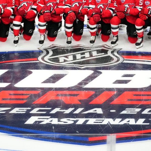 New Jersey Devils' players pose for a photo ahead of a practice session, a day before their NHL hockey game against Buffalo Sabres, in Prague, Czech Republic, Thursday, Oct. 3, 2024. (AP Photo/Petr David Josek)