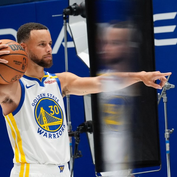 Golden State Warriors' Stephen Curry poses for a photo during the NBA basketball team's media day Monday, Sept. 30, 2024, in San Francisco. (AP Photo/Godofredo A. Vásquez)