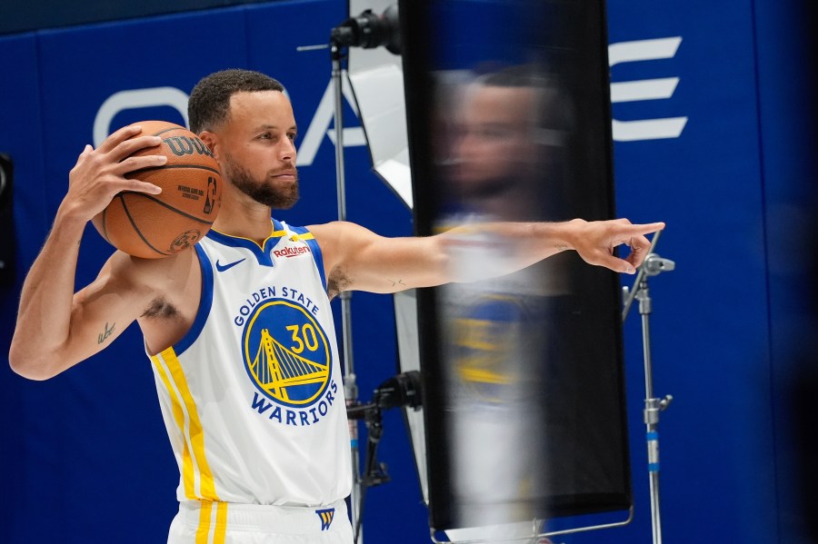 Golden State Warriors' Stephen Curry poses for a photo during the NBA basketball team's media day Monday, Sept. 30, 2024, in San Francisco. (AP Photo/Godofredo A. Vásquez)