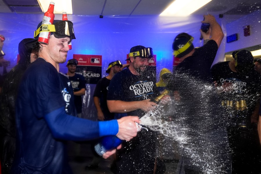 Kansas City Royals shortstop Bobby Witt Jr. celebrates with teammates after defeating the Baltimore Orioles 2-1 in Game 2 of an AL Wild Card Series baseball game, Wednesday, Oct. 2, 2024 in Baltimore. (AP Photo/Stephanie Scarbrough)