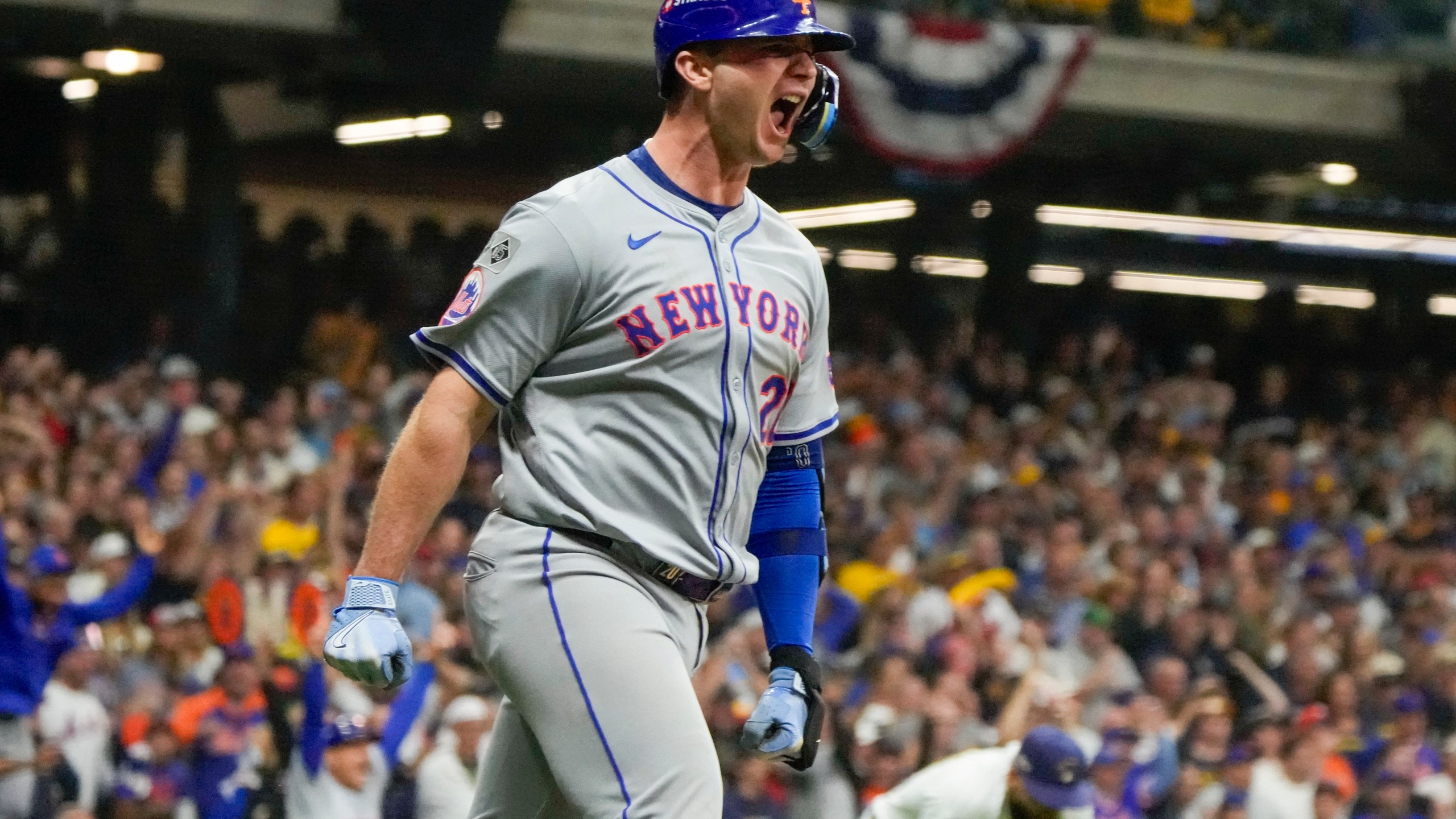 New York Mets' Pete Alonso reacts after hitting a three-run home run during the ninth inning of Game 3 of a National League wild card baseball game against the Milwaukee Brewers Thursday, Oct. 3, 2024, in Milwaukee. (AP Photo/Morry Gash)