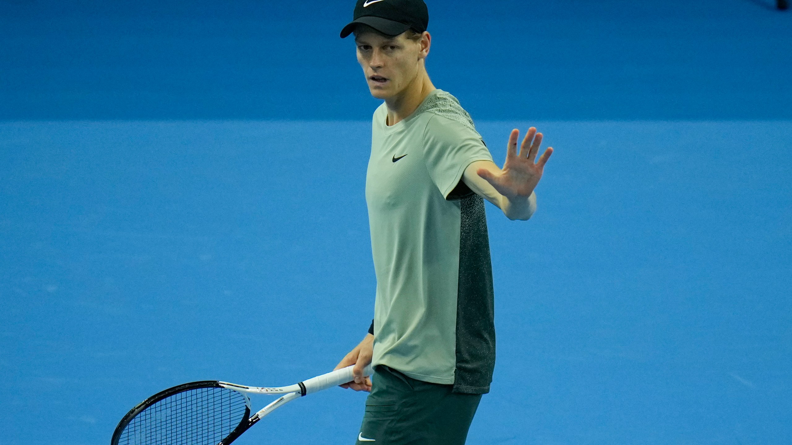 Jannik Sinner of Italy gestures during their men's singles finals match against Carlos Alcaraz of Spain at the China Open tennis tournament, National Tennis Center in Beijing, Wednesday, Oct. 2, 2024. (AP Photo/Andy Wong)