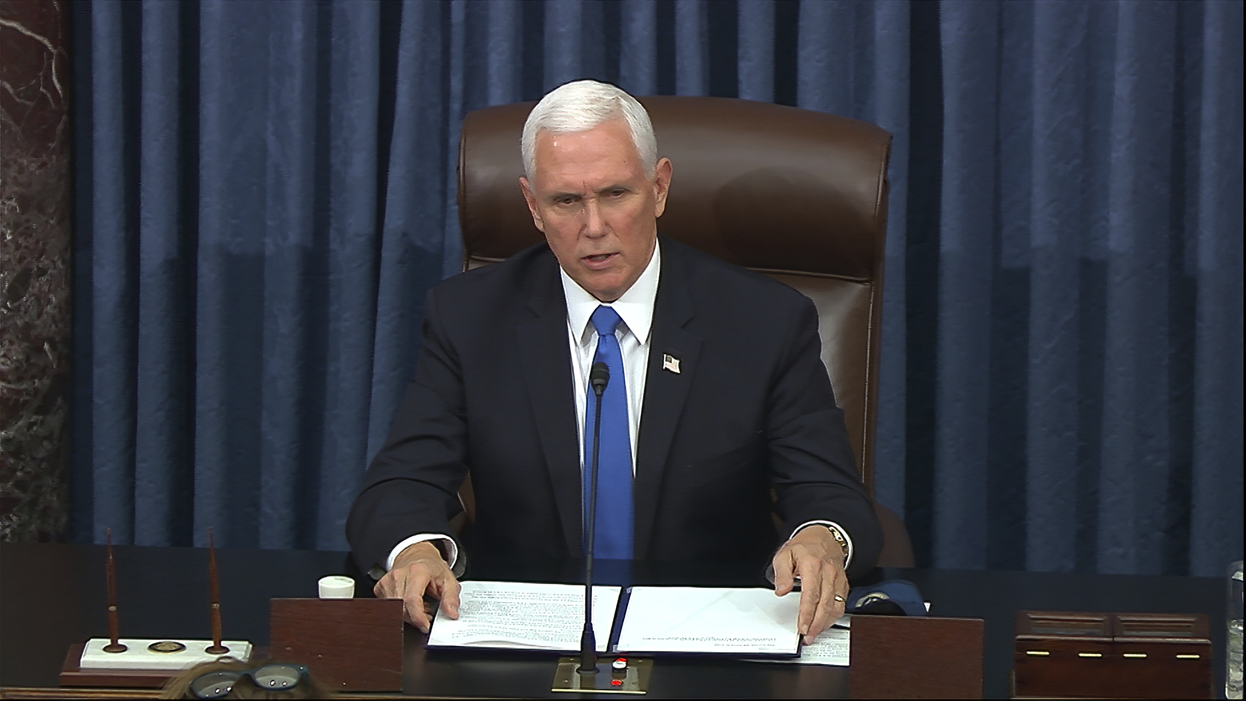 In this image from video, Vice President Mike Pence speaks as the Senate reconvenes after protesters stormed into the U.S. Capitol Wednesday, Jan. 6, 2021. (Senate Television via AP)