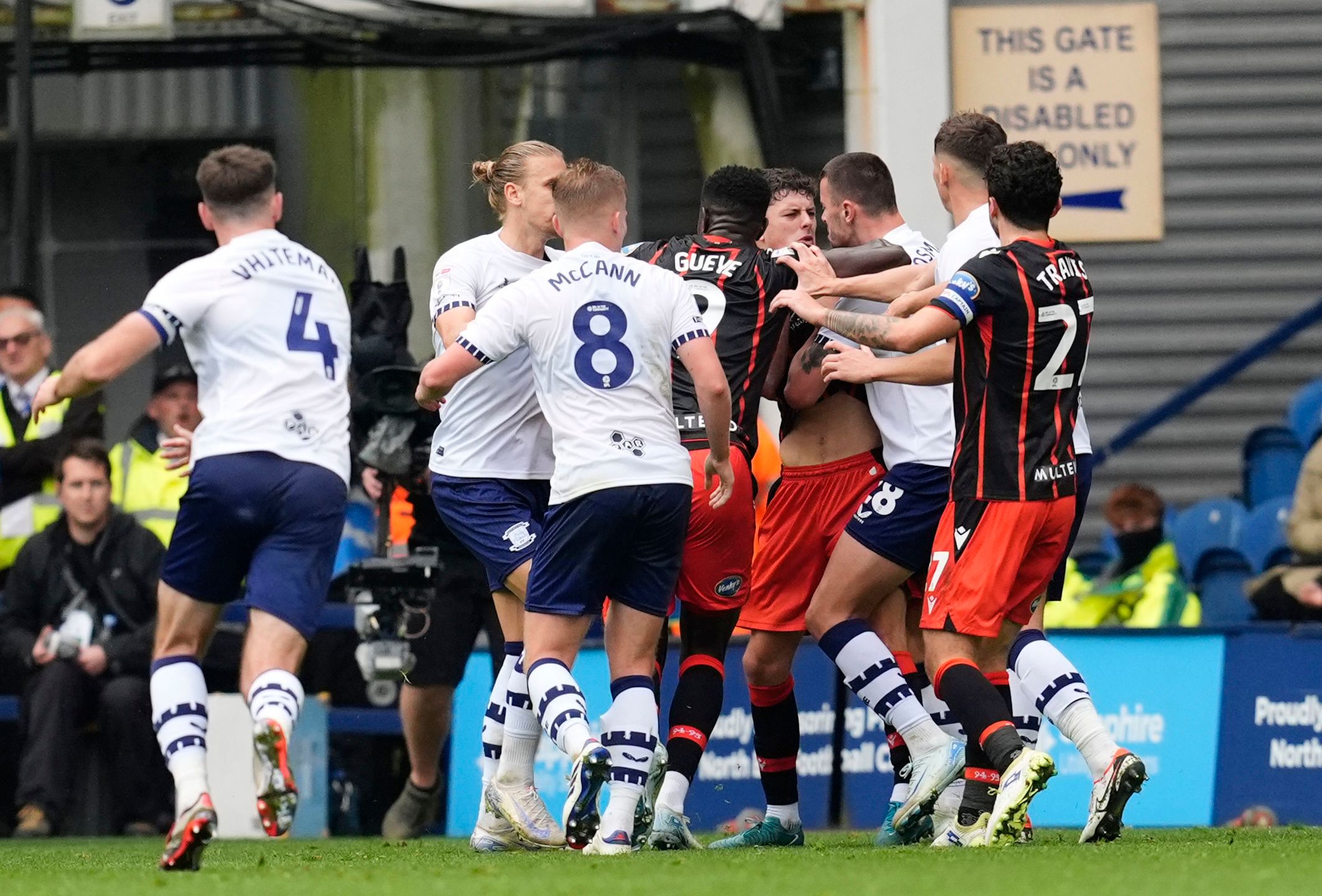 Blackburn Rovers' Owen Beck is confronted by Preston North End's Milutin Osmajic before being shown a red card, during an English Football League soccer match, at Deepdale, in Preston, England, Sunday, Sept. 22, 2024. (Nick Potts/PA via AP)