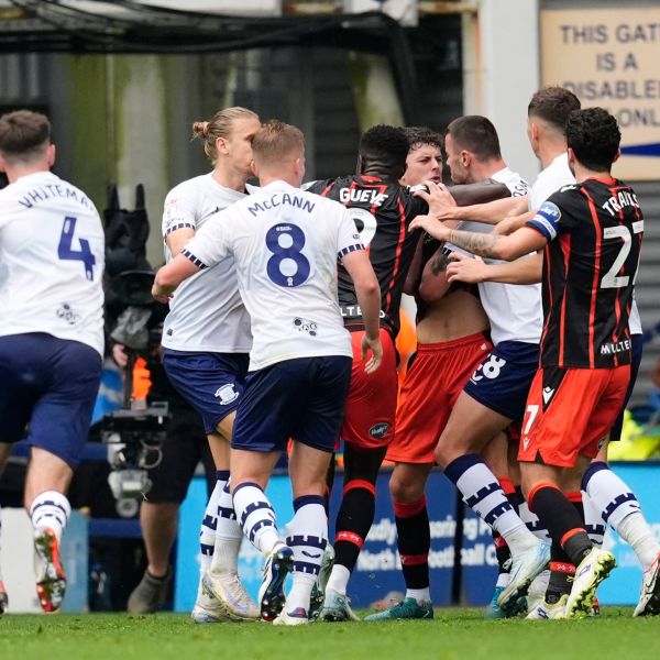 Blackburn Rovers' Owen Beck is confronted by Preston North End's Milutin Osmajic before being shown a red card, during an English Football League soccer match, at Deepdale, in Preston, England, Sunday, Sept. 22, 2024. (Nick Potts/PA via AP)