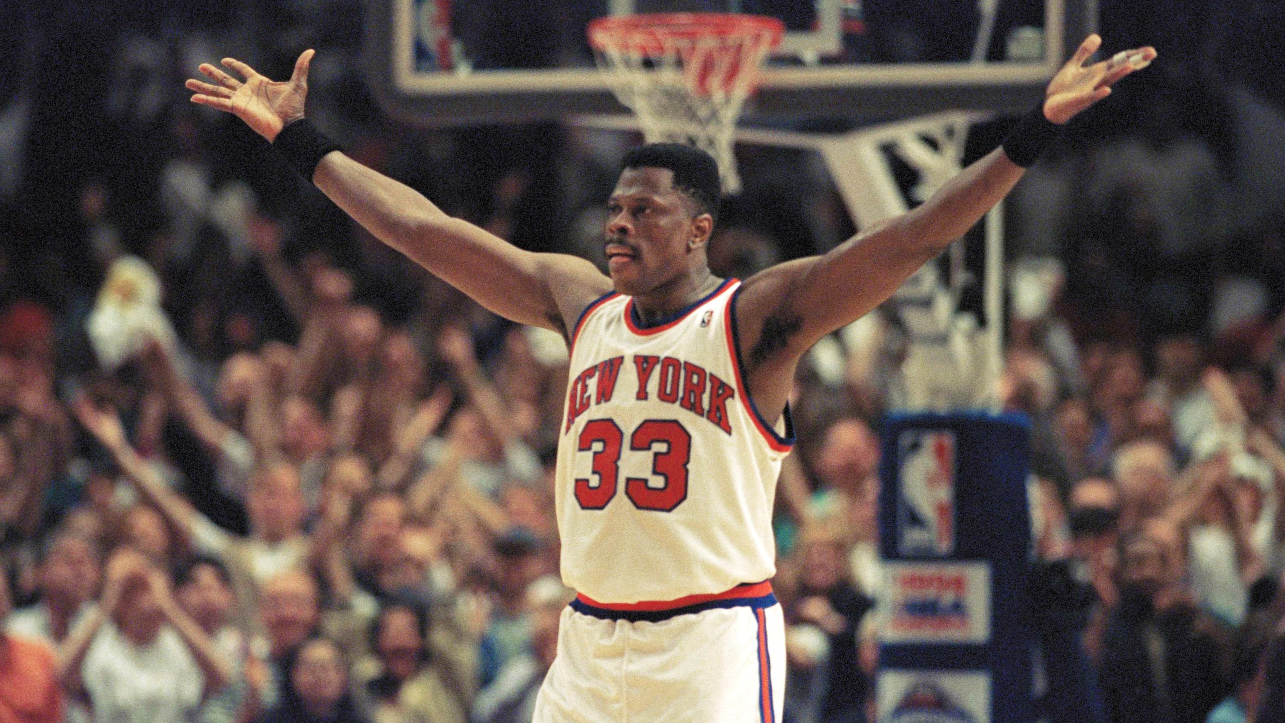 FILE - New York Knicks center Patrick Ewing pumps up the fans crowded into New York's Madison Square Garden in New York, May 22, 1994. (AP Photo/Bill Kostroun, File)