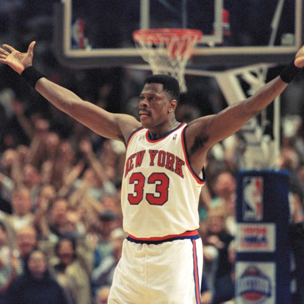 FILE - New York Knicks center Patrick Ewing pumps up the fans crowded into New York's Madison Square Garden in New York, May 22, 1994. (AP Photo/Bill Kostroun, File)