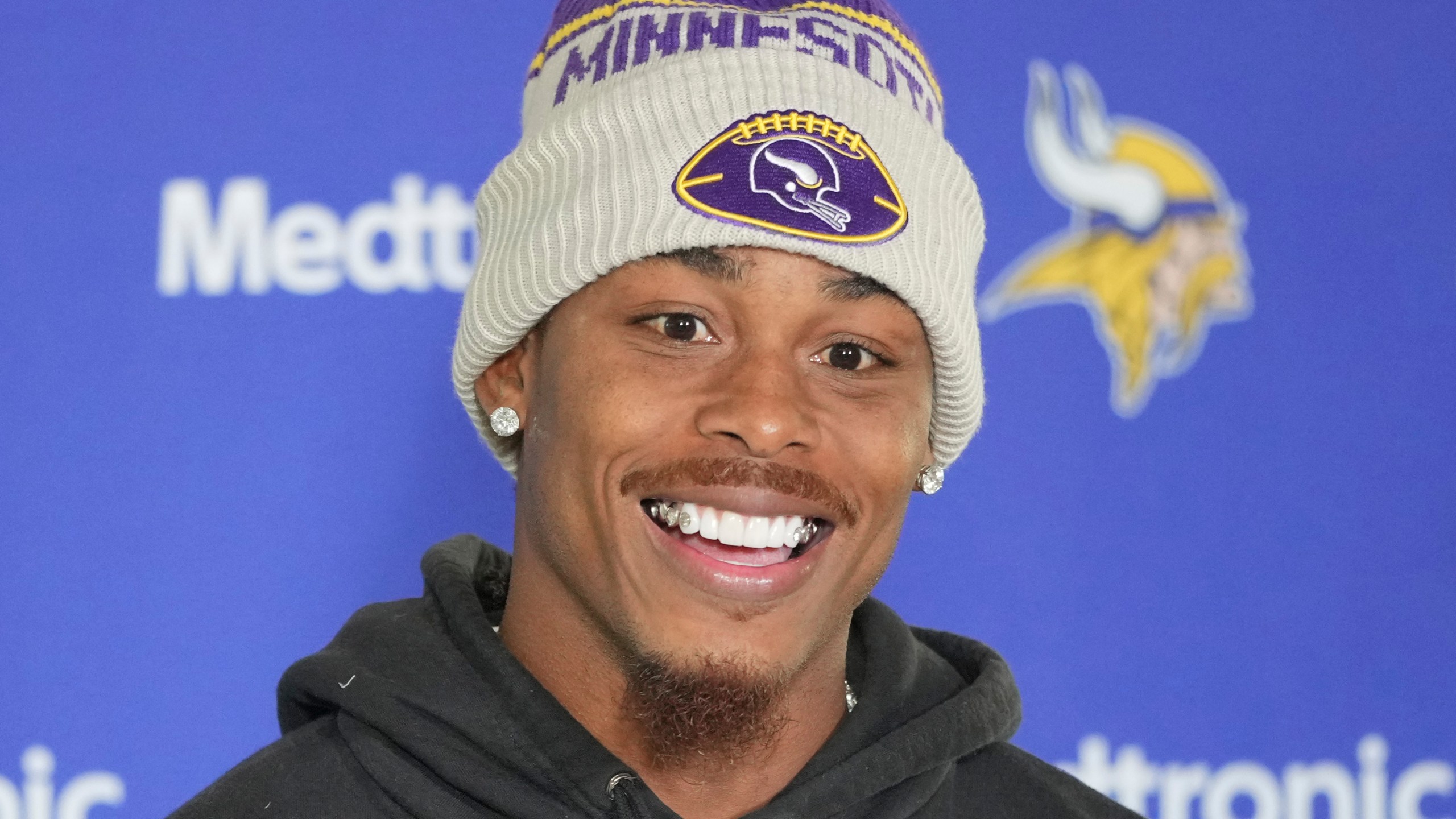 Minnesota Vikings wide receiver Justin Jefferson speaks during a news conference after NFL football practice at The Grove in Watford, England, Friday, Oct. 4, 2024. (AP Photo/Kin Cheung)