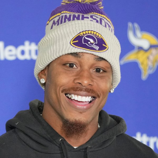 Minnesota Vikings wide receiver Justin Jefferson speaks during a news conference after NFL football practice at The Grove in Watford, England, Friday, Oct. 4, 2024. (AP Photo/Kin Cheung)