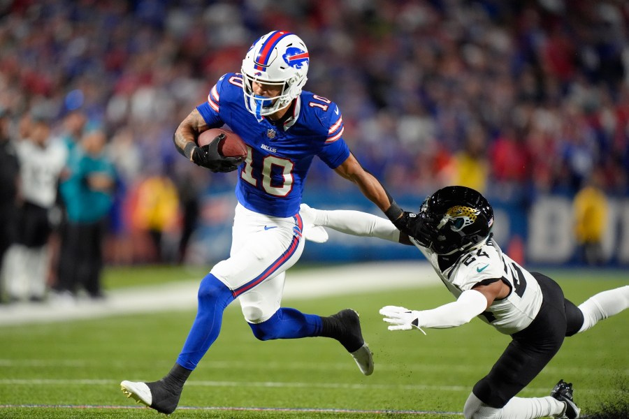 Buffalo Bills wide receiver Khalil Shakir (10) runs past Jacksonville Jaguars cornerback De'Antre Prince (24) to score a touchdown during the first half of an NFL football game Monday, Sept. 23, 2024, in Orchard Park, NY. (AP Photo/Steven Senne)