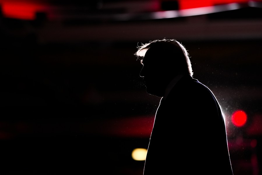 Republican presidential nominee former President Donald Trump walks from the stage at a campaign event at the Ryder Center at Saginaw Valley State University, Thursday, Oct. 3, 2024, in University Center, Mich. (AP Photo/Alex Brandon)