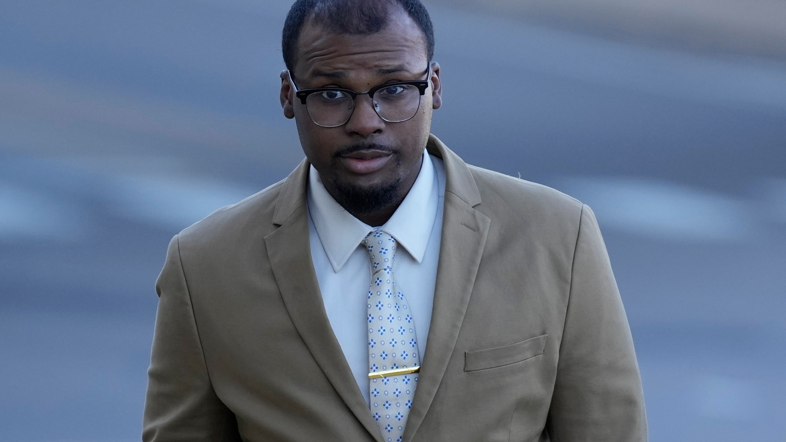 Justin Smith, one of three former Memphis police officers charged in the 2023 fatal beating of Tyre Nichols, arrives at the federal courthouse for the day's proceedings Thursday, Oct. 3, 2024, in Memphis, Tenn. (AP Photo/George Walker IV)