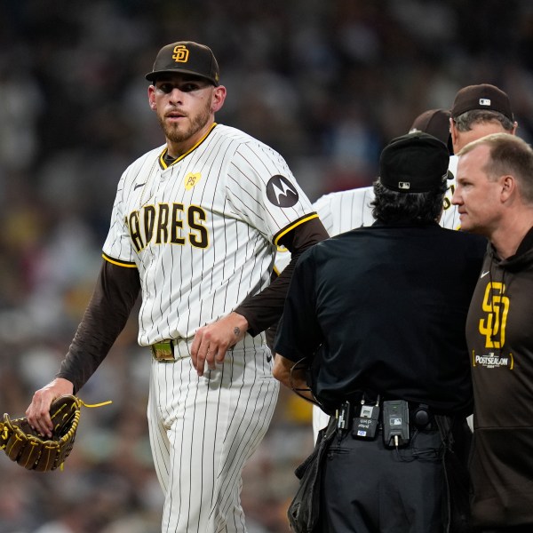 San Diego Padres starting pitcher Joe Musgrove exits the game during the fourth inning in Game 2 of an NL Wild Card Series baseball game against the Atlanta Braves, Wednesday, Oct. 2, 2024, in San Diego. (AP Photo/Gregory Bull)