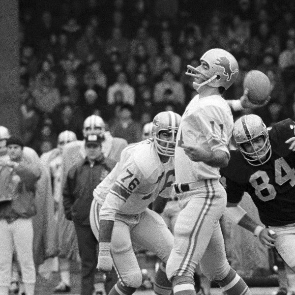 FILE - Detroit Lions quarterback Greg Landry looks for Chuck Walton somewhere downfield during an NFL football game against the Oakland Raiders in Detroit, Nov. 26, 1970. (AP Photo/JMC, File)