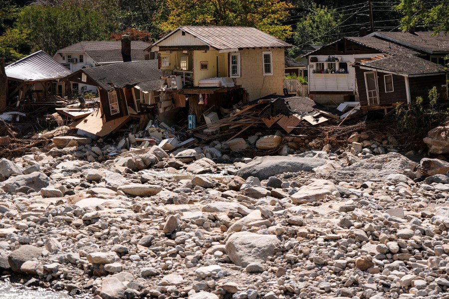 Homes are seen in the aftermath of Hurricane Helene, Wednesday, Oct. 2, 2024, in Chimney Rock Village, N.C. (AP Photo/Mike Stewart)